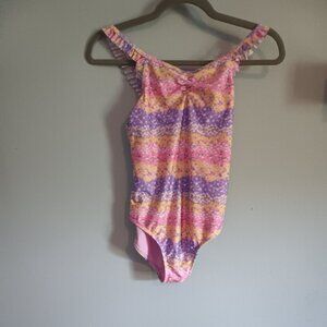 Pink, purple, and orange floral swim suit